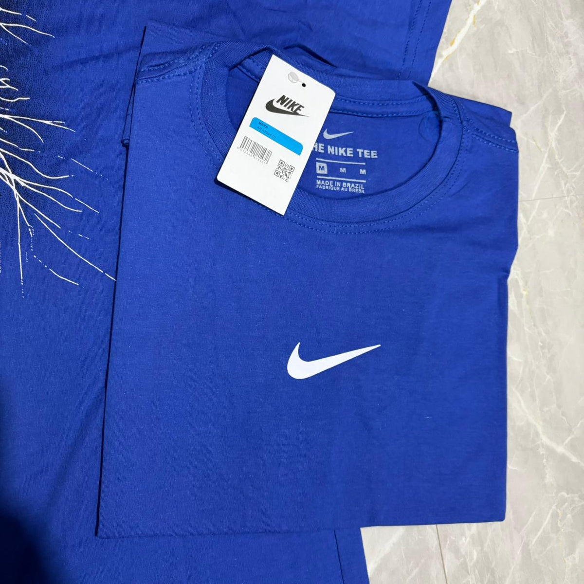 Camiseta Grife NIKE Azul Royal com Mini Swoosh Clássico