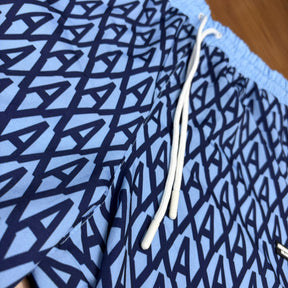 Shorts Grife Armani Exchange AX Azul Claro com Estampa Geométrica Logo e Faixas Laterais