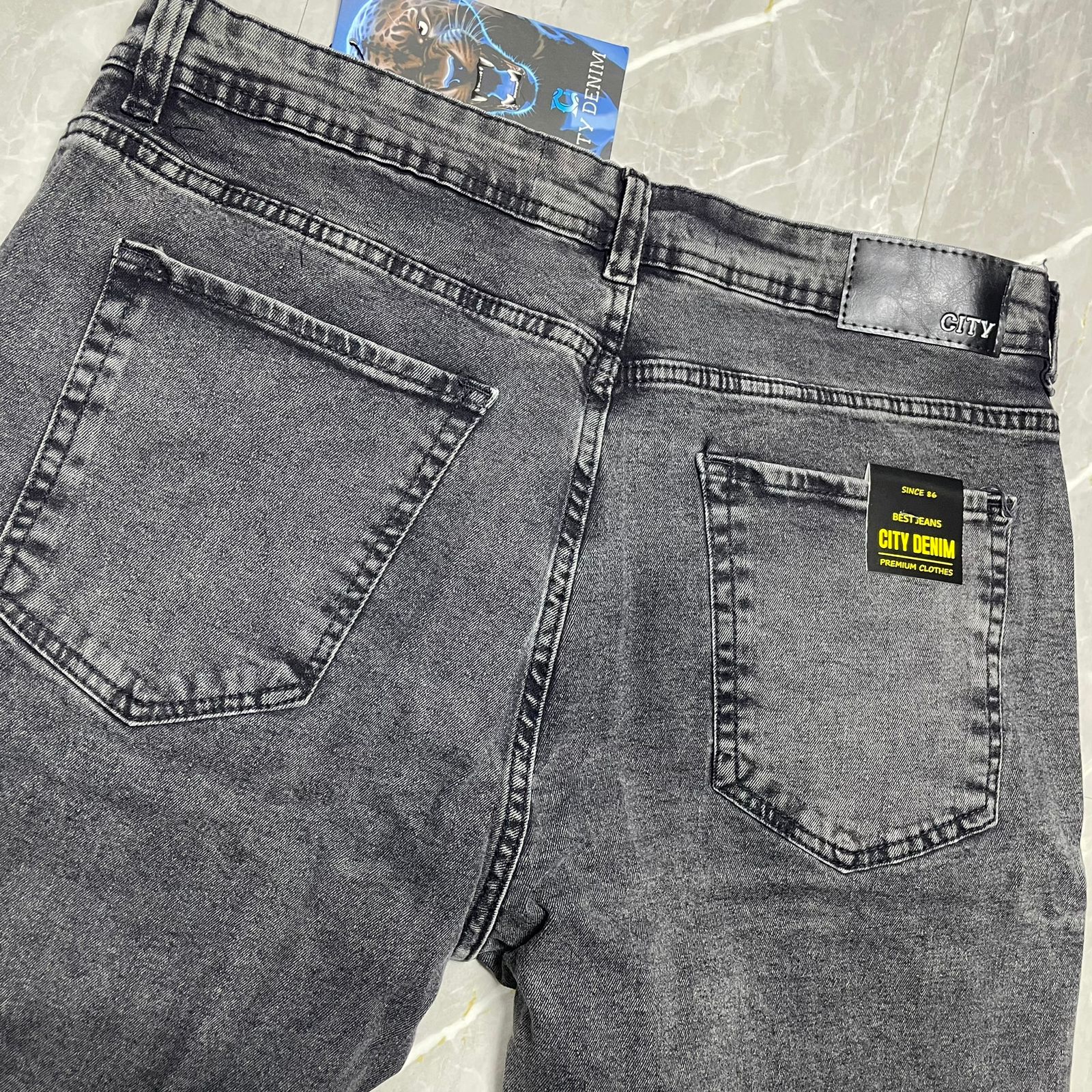 Calça Jeans Jogador City Denim Rasgo com Tinta Preto Grafite