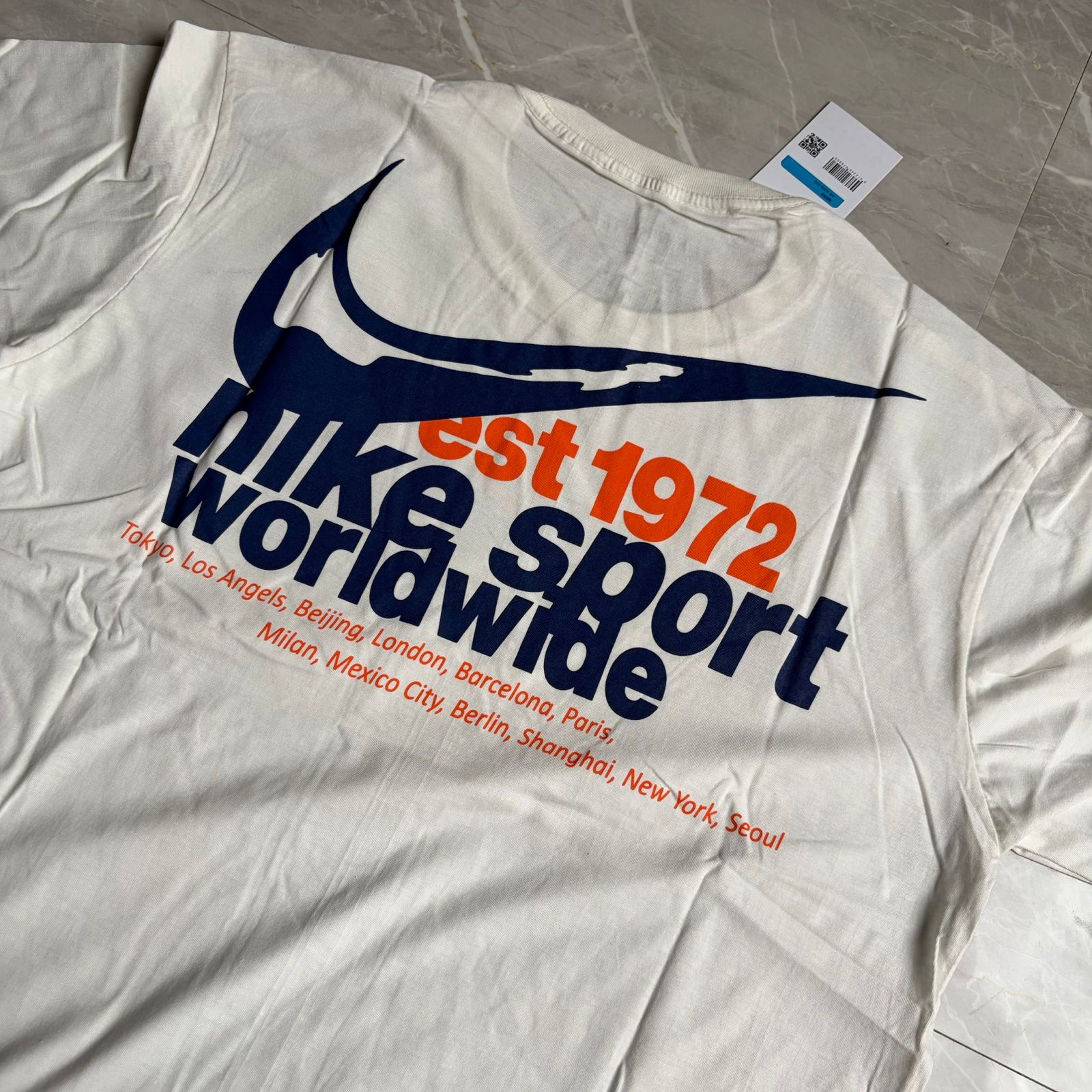 Camiseta Grife Nike Sport WorldWide Off White