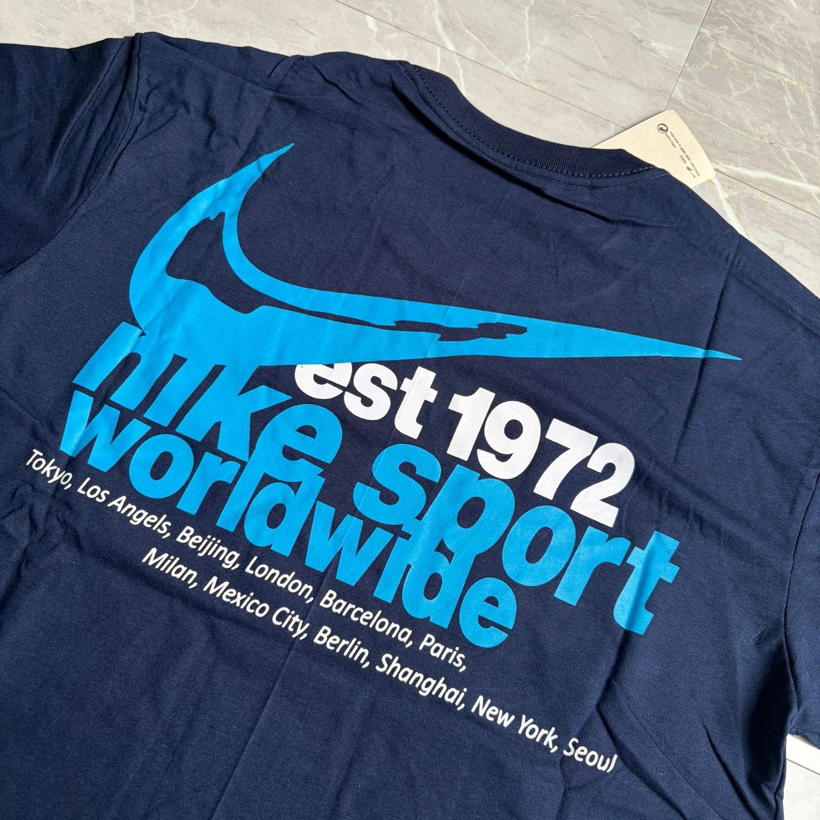 Camiseta Grife Nike Sport WorldWide Azul Marinho