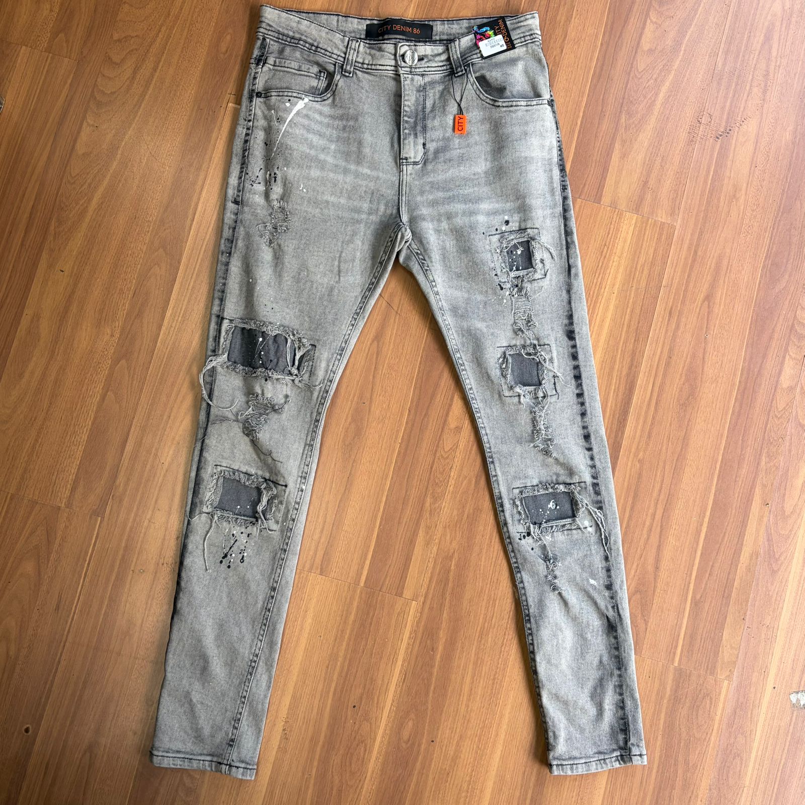 Calça Jeans Jogador Cinza Grafite Rasgada City Denim
